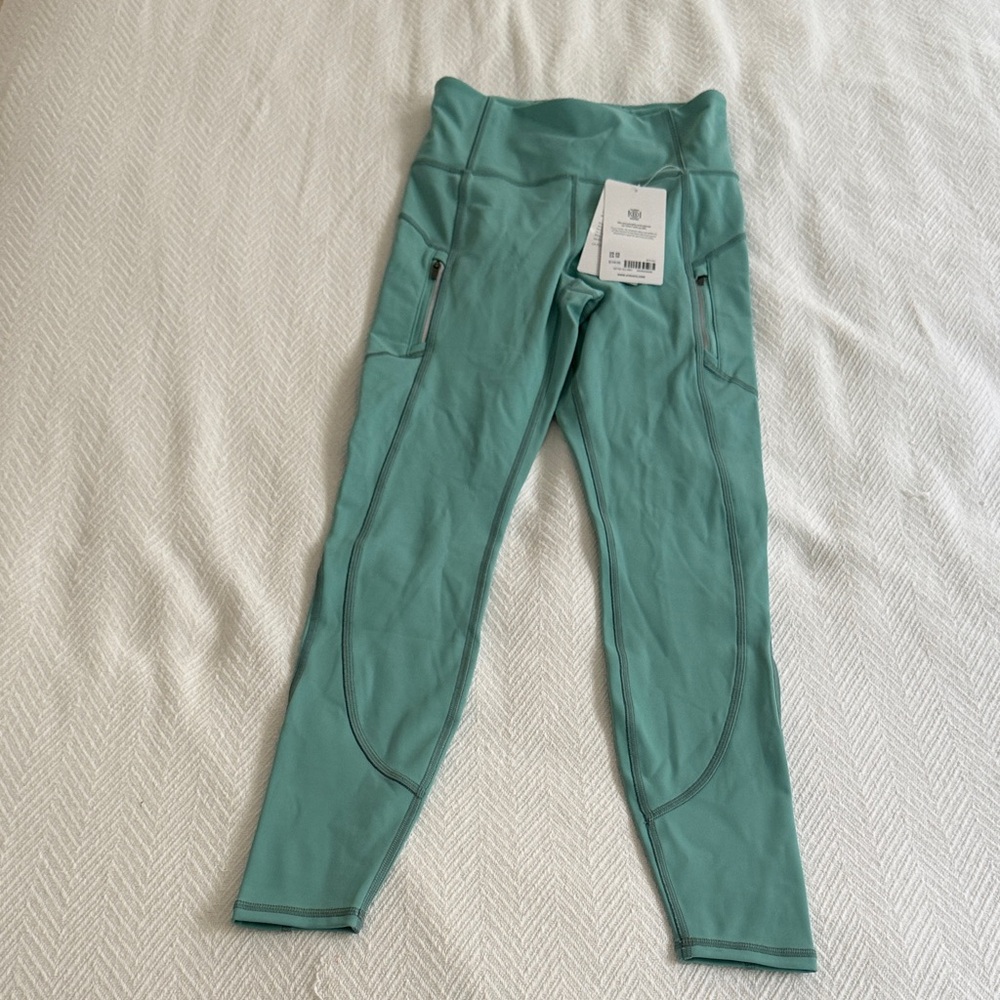 Athleta women’s turquoise leggings XS NWT